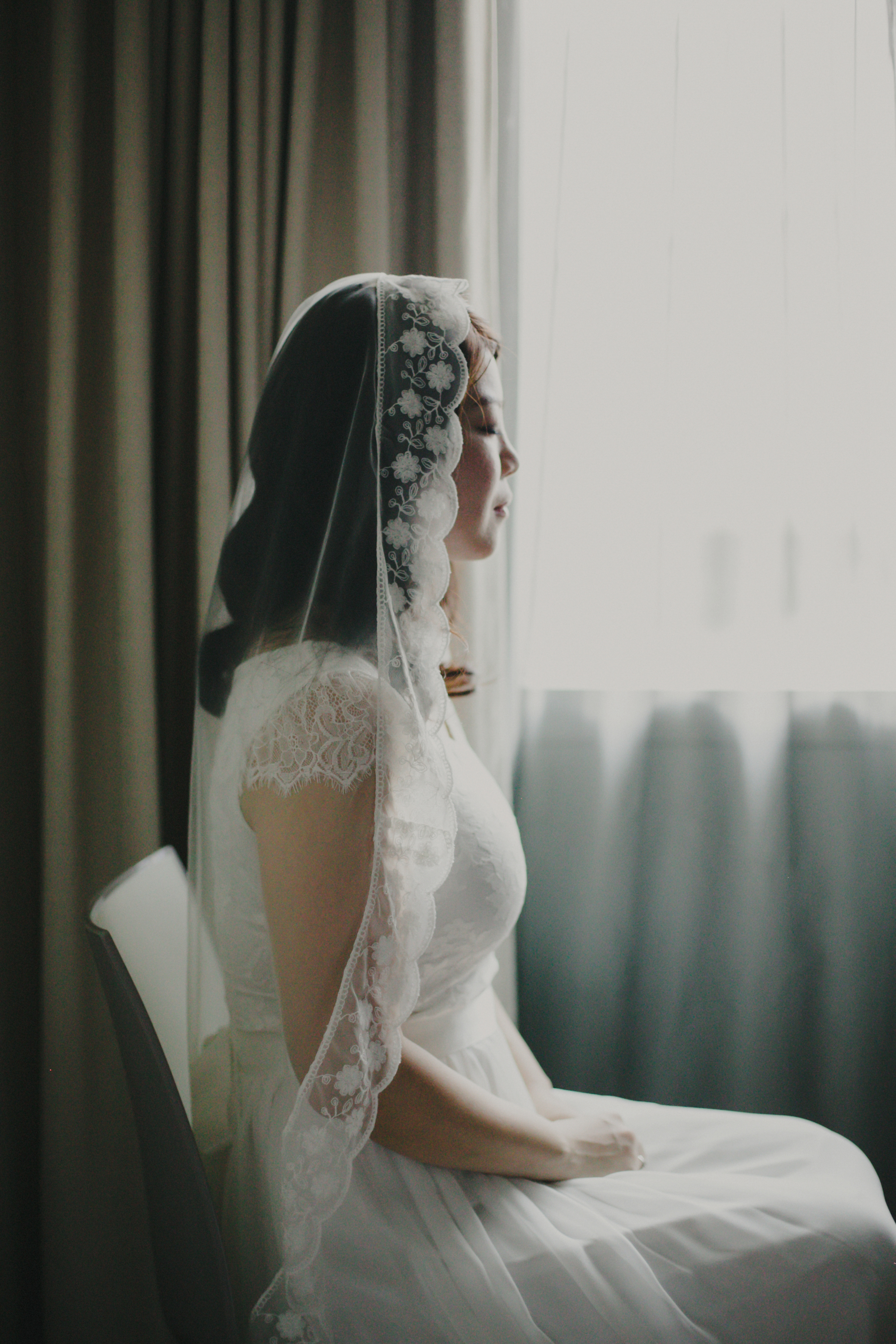 Bride with lay over veil